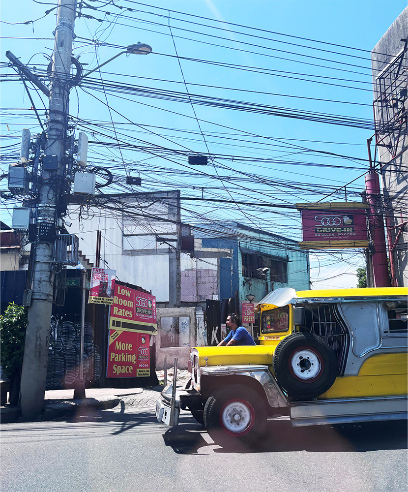 A Jeepney navigating Manila traffic